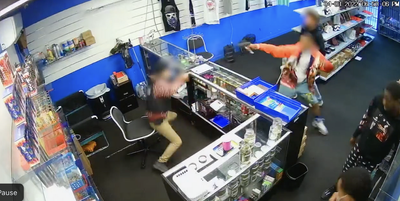 Video shows fatal shootout in California store as security guard pulls gun on would-be robbers