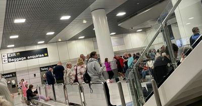 Manchester Airport passengers told to wait hours - or baggage will be delivered 'some time next week'