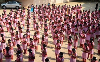 The school dress is in the cross hairs