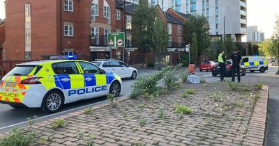 Pedestrian 'hit by car' and rushed to hospital after crash on major Manchester road