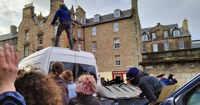 Scots gather to block Home Office ‘immigration raid’ at Edinburgh restaurant with police called