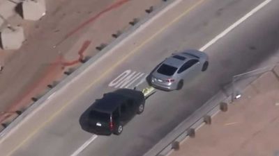See Arizona Police Use Grappler On Fleeing Suspect To End Car Chase