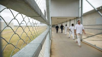 South Australia's corrections department facing legal action after refusal to supply prisoners with voting materials