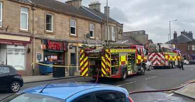 Emergency services rush to Lanarkshire flat after smoke seen billowing from window