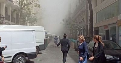 Madrid building explosion leaves firefighters trying to free people from rubble
