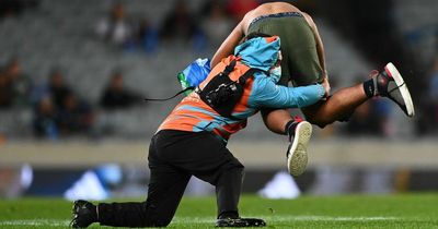 Giant rugby pitch intruder completely wiped out by brave steward