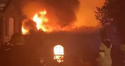 Oldham fire: Huge blaze sends plumes of smoke into night sky as explosions heard