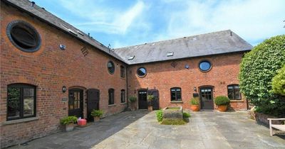 Inside 'breath-taking' barn conversion down cobbled street for sale