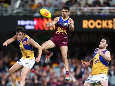 Lions run over depleted, valiant Eagles