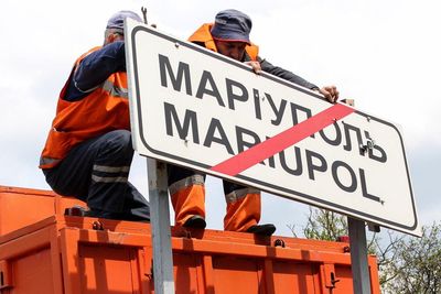 Mariupol road signs changed to Russian ahead of Victory Day parade