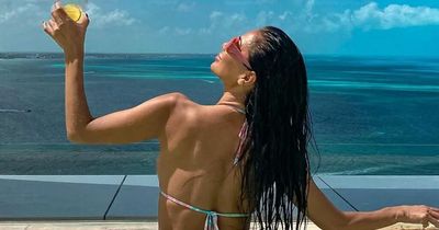 Nicole Scherzinger shows off her flexibility in tiny bikini as she does splits in pool