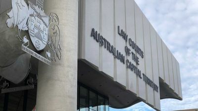 Canberra man who breached COVID-19 isolation to threaten neighbour with axe sentenced to four years in jail