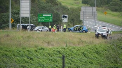 Two men dead and others injured in three-car crash at Springfield, west of Brisbane