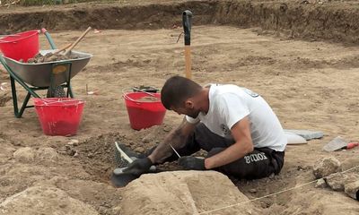 Iron-age boxer statues’ torsos discovered in Sardinian necropolis