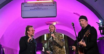 U2 stars Bono and The Edge support Ukraine with gig in metro station