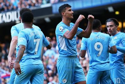 Five star Manchester City power three points clear of title rivals Liverpool