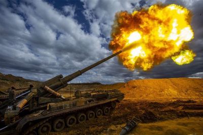 VIDEO: Field Of Fire: Russian Tank Blasts Unseen Targets In Ukrainian Field