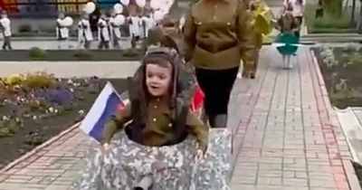 Children dress up as fighter jets and tanks in chilling Russian Victory Day parade