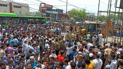 Protests erupt as bulldozers roll into Delhi's Shaheen Bagh, return without action