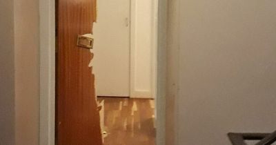 Edinburgh locals watch as police 'in riot gear' smash down neighbour's door