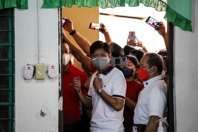 Dictator's son Marcos holds commanding lead in Philippine presidential poll