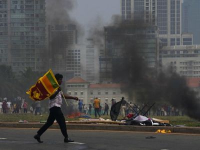 The prime minister of Sri Lanka resigns after weeks of protests