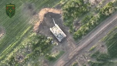 VIDEO: Boom And Busted: Ukrainian Drone Reduces Russian Tank To Scrap