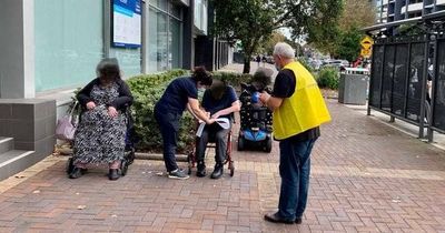 Wheelchair users vote on the street in Newcastle