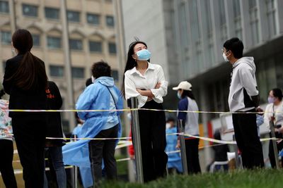 Tesla stutters under tighter Shanghai lockdown; Beijing keeps hunting COVID