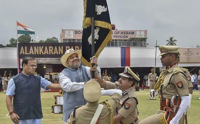 Union Home Minister Amit Shah presents President's Colour to Assam Police for exemplary service