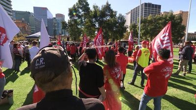 SA aged care workers use day off to rally for better work conditions after strike action delayed until after federal election