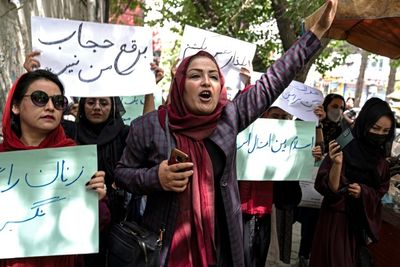 Afghan women protest Taliban decree to cover faces