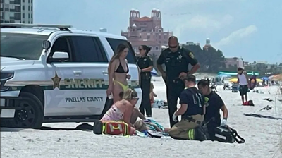 Florida sheriff’s deputy accidentally drives SUV over sunbather, 23, lying on her back at popular beach