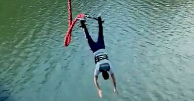 Horrifying moment bungee jumper plummets 130ft into water after cord suddenly detaches