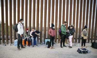 Clothes, shoes, passports: migrants forced to dump possessions at US-Mexico wall