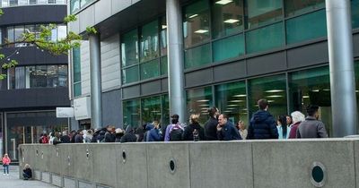 Passport delays see huge queues at offices as holidaymakers wait for hours
