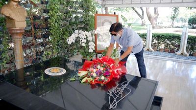 After Philippines election triumph, Marcos visits dictator father's grave
