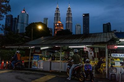 Malaysia central bank hikes interest rate to tame inflation