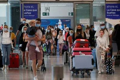 EU to drop Covid face mask rule for airports and flights in Europe