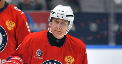 Vladimir Putin appears with mysterious marks on cheeks after missing annual hockey match