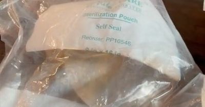 Woman shares clip of 'disgusting' breast implants after getting them removed