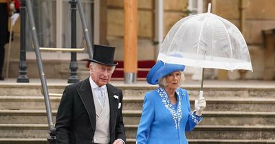 Charles and Camilla brave rain to step in for Queen at first garden party in three years