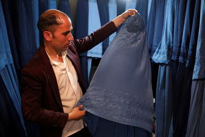 Many Afghan women pushing back against Taliban orders to cover up