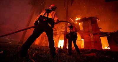 Luxury ocean-side homes erupt in huge flames after devastating brush fire