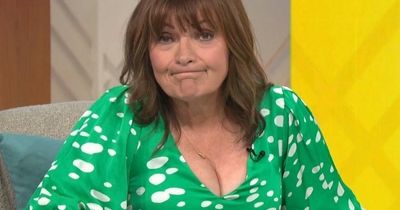 Lorraine Kelly distracts viewers from their breakfast in plunging silk dress