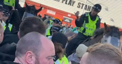 Celtic fans yell at cops while 'being crushed' after streets closed ahead of Dundee United clash