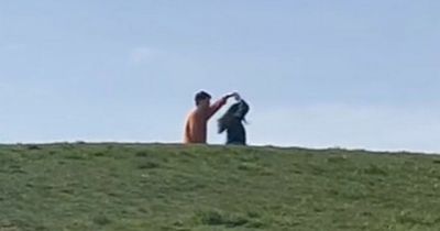 Edinburgh couple filmed enjoying impromptu dance in the sun at popular beauty spot