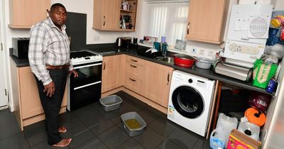 Single dad and kids living on takeaways as dirty water runs into kitchen