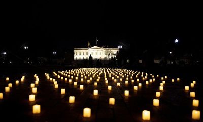 Biden marks imminent ‘tragic milestone’ of 1m US Covid deaths in address to global summit – as it happened