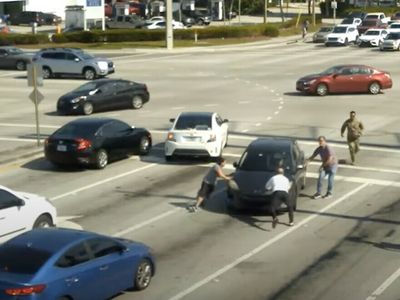 Good Samaritans save a driver having a medical issue at a busy intersection